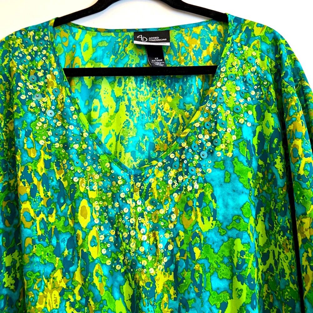 Sheer green and aqua tunic that ties at the waist.